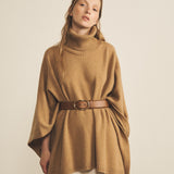 A camel, turtleneck women cashmere poncho with cut sides - face view | Angela | Linnea Lund