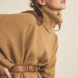 A camel, turtleneck women cashmere poncho with cut sides - side view | Angela | Linnea Lund