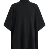 black cashmere poncho with turtle neck.