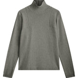 gray cashmere turtle neck with deep modified drop sleeves.