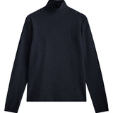 dark navy cashmere turtle neck with deep modified drop sleeves.