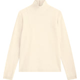 White cashmere turtle neck with deep modified drop sleeves