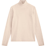 light pink cashmere turtle neck with deep modified drop sleeves