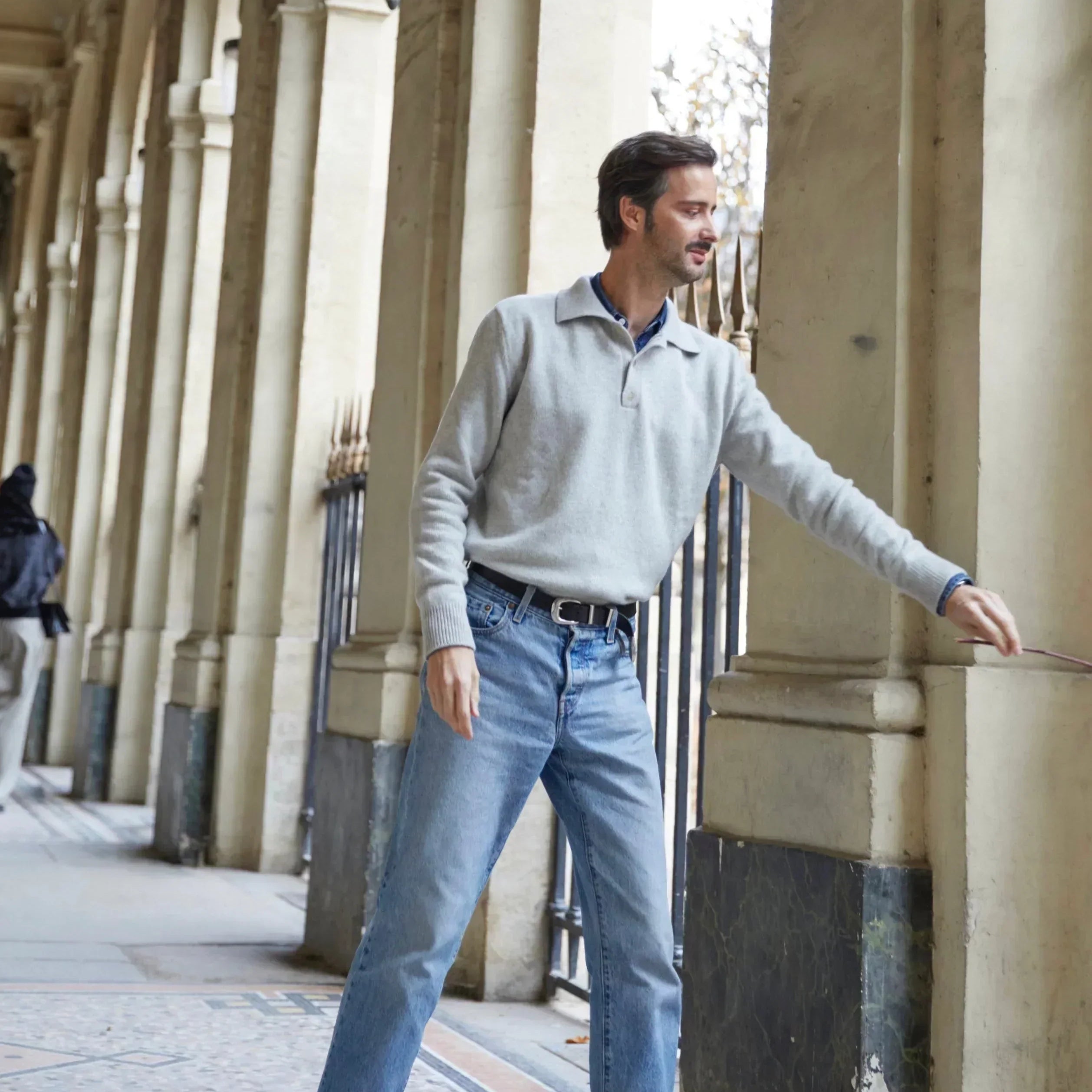 Adrien Coelho wearing the Ralph grey cashmere sweater by Linnea Lund at the Palais-Royal in Paris.
