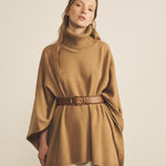 A camel, turtleneck women cashmere poncho with cut sides - face view | Angela | Linnea Lund