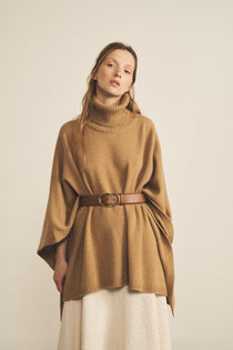 A camel, turtleneck women cashmere poncho with cut sides - face view | Angela | Linnea Lund