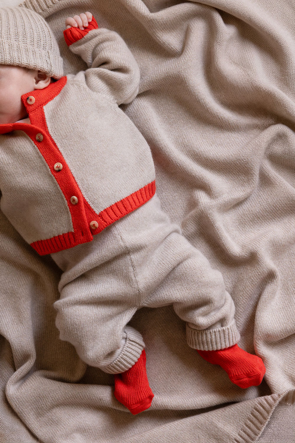 Baby cashmere cardigan beige and orange, second view | Phoebe | Linnea Lund