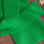 Flash green cashmere mittens and sweater | Noah & Maya | Linnea Lund