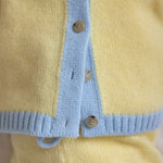 Baby cashmere cardigan yellow and blue, close-up | Phoebe | Linnea Lund