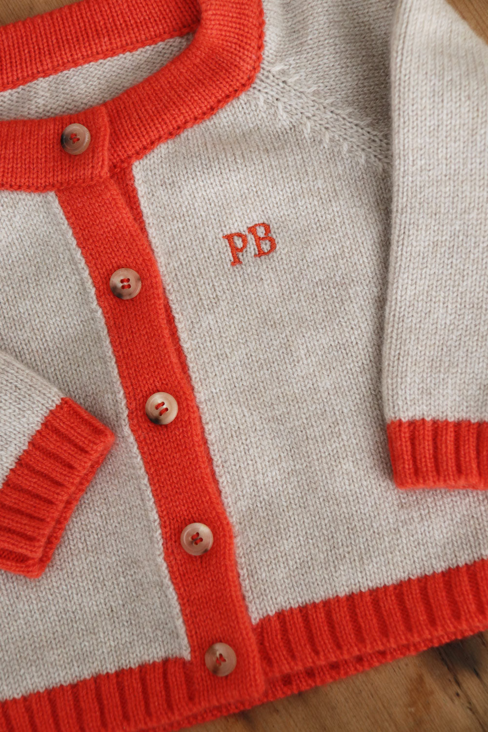 Baby cashmere cardigan beige and orange, embrodery | Phoebe | Linnea Lund
