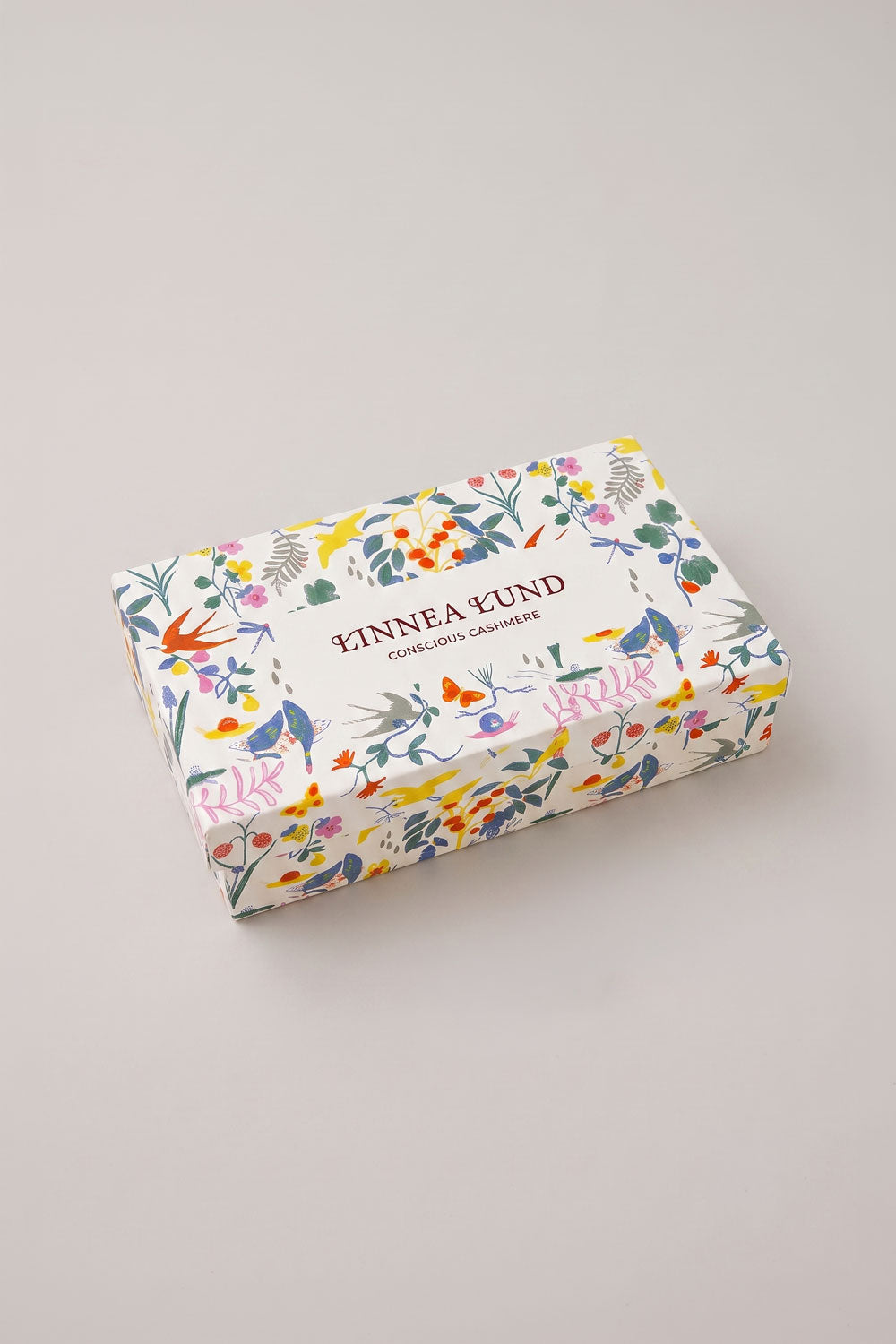 Linnea Lund gift box with colorful floral print, birds and butterflies, top view