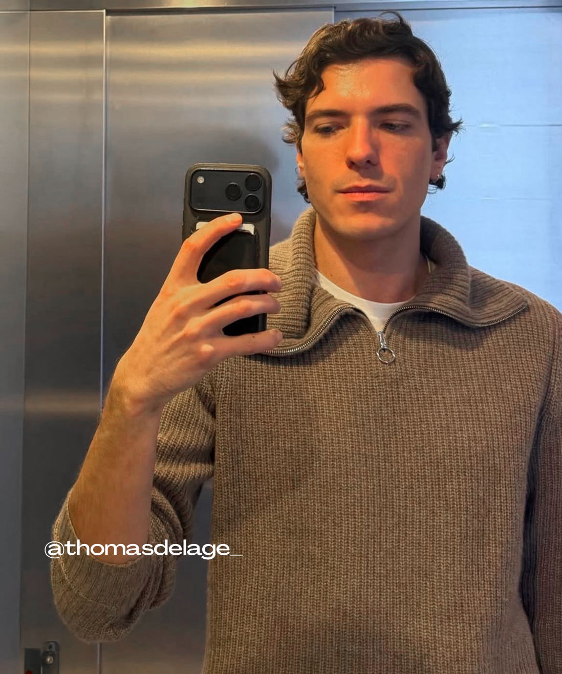 Thomas Delage wearing the Linnea Lund cashmere sweater Sam