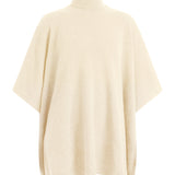 White cashmere poncho with turtle neck collar