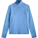 light blue cashmere turtle neck with deep modified drop sleeves
