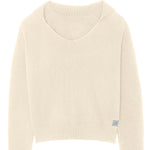 Off- white unisex cashmere sweater featuring a v-neckline, ribbed collar, loose fitting.