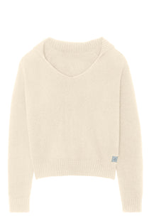 Off- white unisex cashmere sweater featuring a v-neckline, ribbed collar, loose fitting.